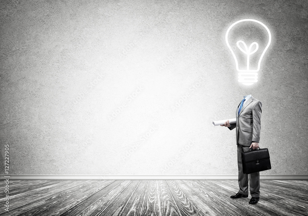 Obraz premium Bulb headed businessman