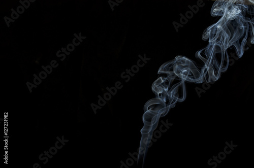 Incense Smoke on Black Blackground
