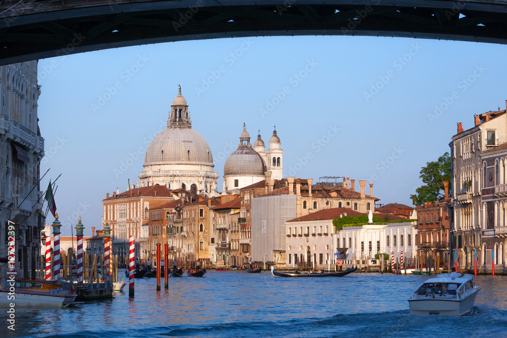 view of famous Canal Grande and Basilica di Santa Maria della Salute in Venice, Italy
