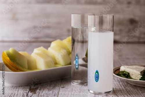 Canvas Print Turkish Drink Raki with melon and feta cheese.