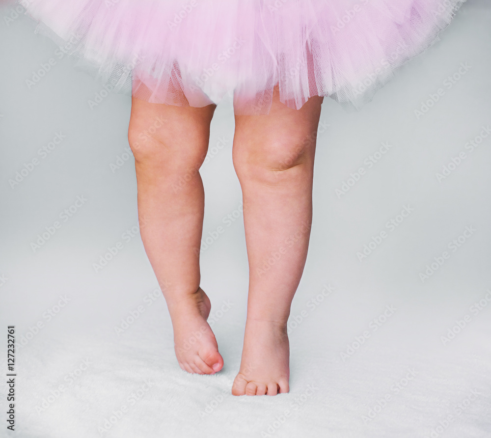 baby girl like a ballet dancer in pink tutu, isolated on white background baby girl like a ballet dancer in pink tutu, isolated on white background