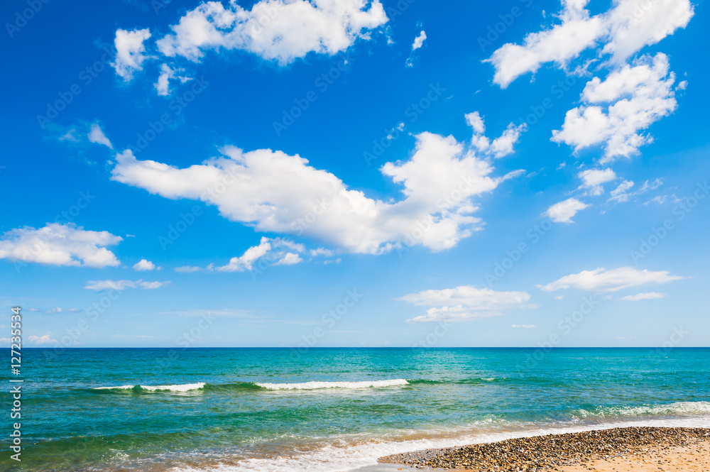 Beautiful beach and blue sky with clouds.