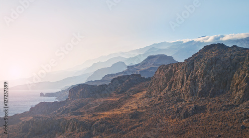 beautiful mountains and evening sun panorama