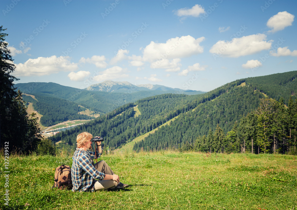 Young traveler enjoying mountain view Young traveler enjoying mountain view