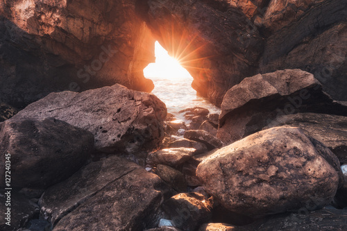 Sunlight through rock arch