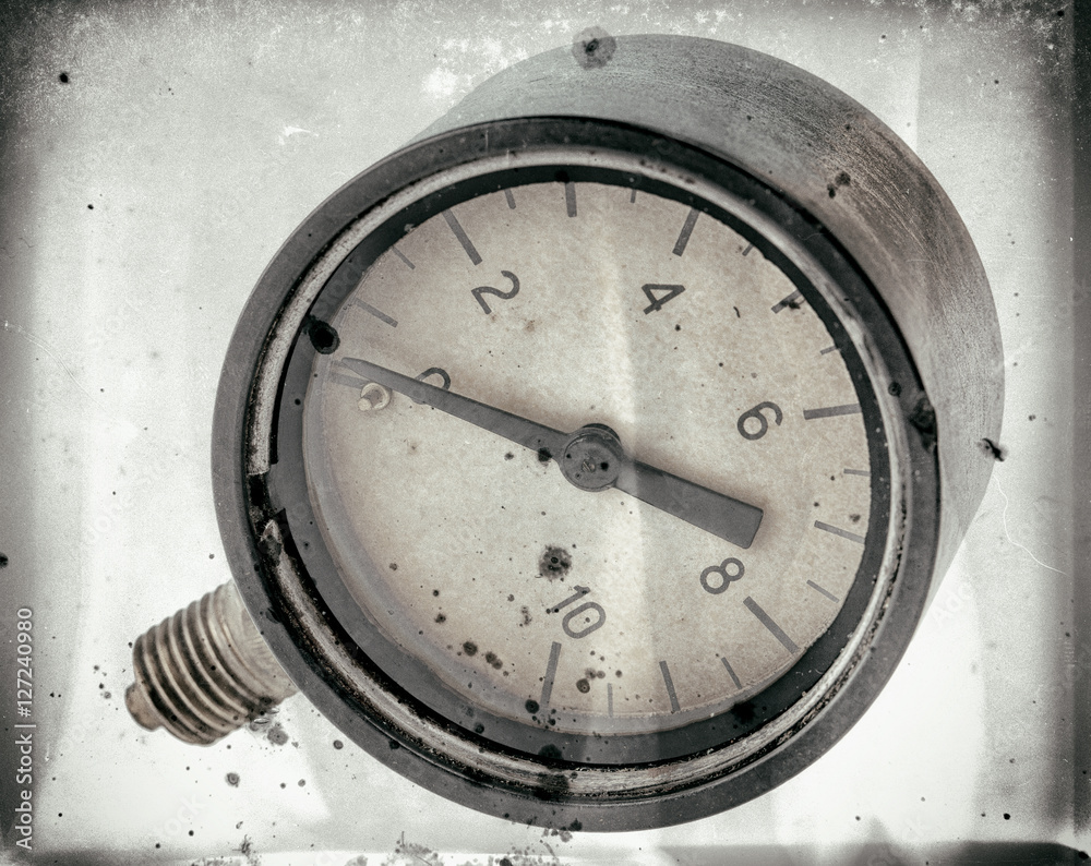 The old vintage measuring device with a scale from 0 to 10, and the