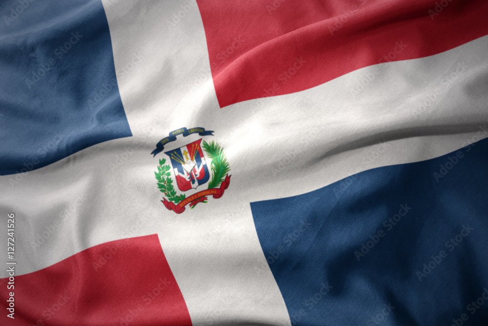 waving colorful flag of dominican republic. - obrazy, fototapety, plakaty 