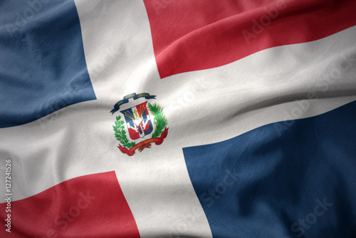 waving colorful flag of dominican republic. photo