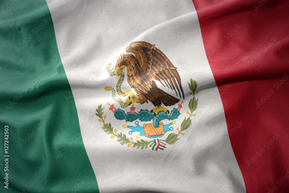 Naklejka premium waving colorful flag of mexico.