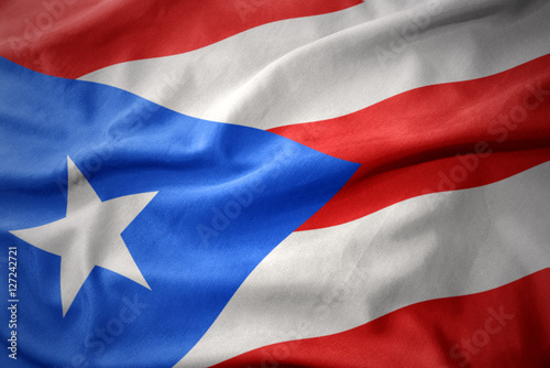 waving colorful flag of puerto rico. photo