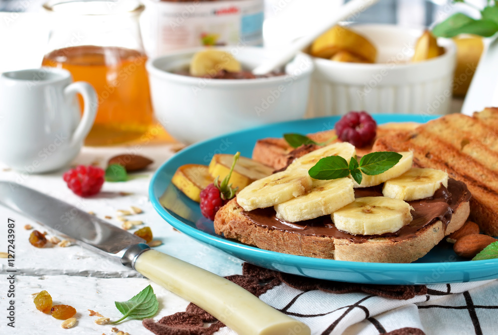Good morning - toast with walnut, chocolate paste, banana.