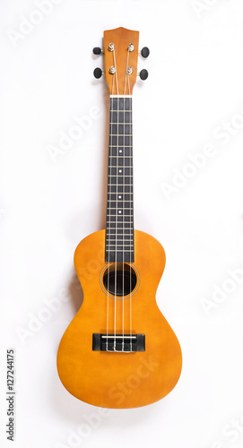 Ukulele close up in white background. Music concept.