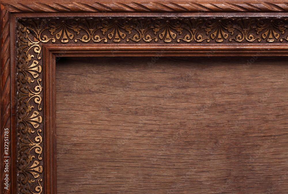 Antique carved wooden frame with copy space Antique carved wooden frame with copy space
