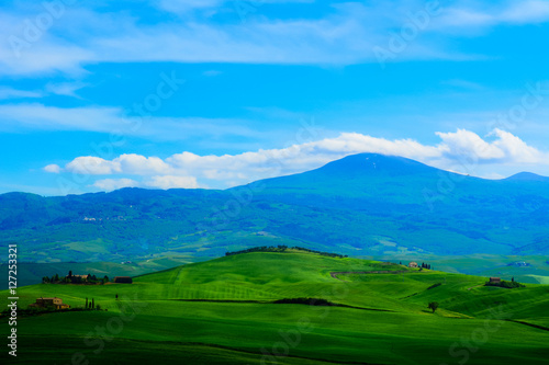 Tuscany, rural landscape in spring. Countryside green field and