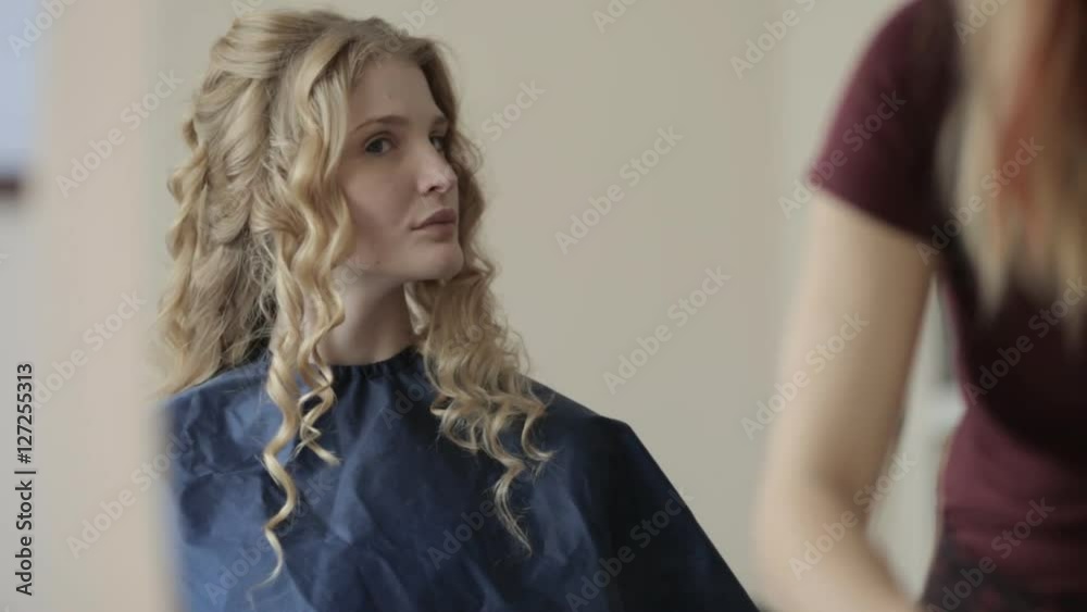 young model is preparing for a fashion show in the beauty salon young model is preparing for a fashion show in the beauty salon