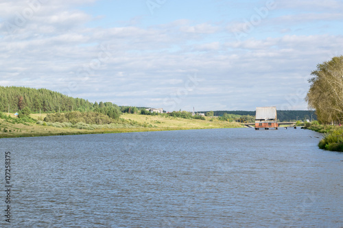 Obraz na płótnie Russian traditional village river landscape w salonie