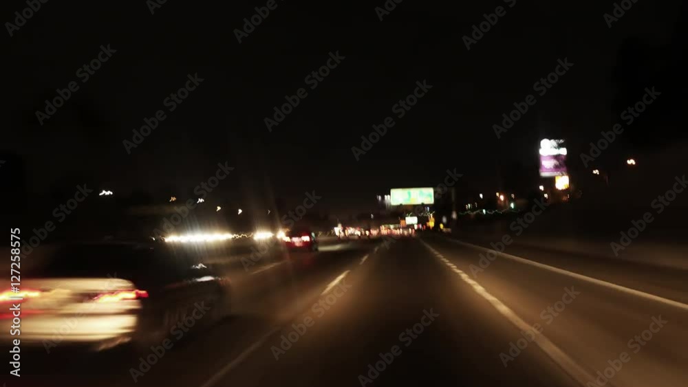 Time lapse of a car driving in Night Freeway
Time lapse of a car driving in Night Freeway
