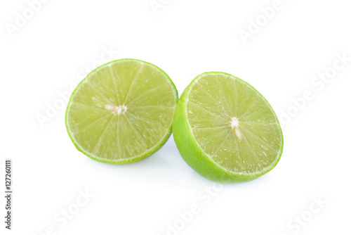 half cut lime with seed on white background