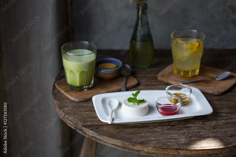Dessert panna cotta with fresh berries on wooden background, selective focus.Traditional Italian dessert. Valentines Day background Dessert panna cotta with fresh berries on wooden background, selective focus.Traditional Italian dessert. Valentines Day background