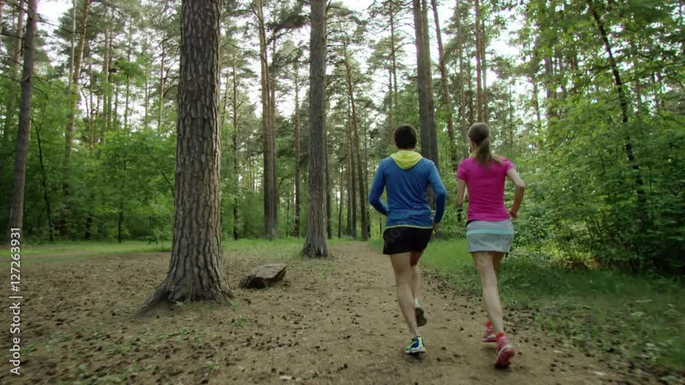 running in a forest running in a forest