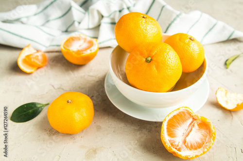 fresh tangerines on table