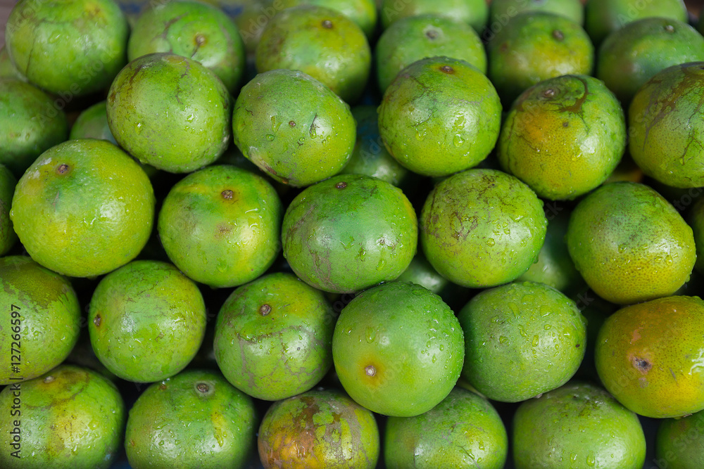 fresh green orange background in the market fresh green orange background in the market