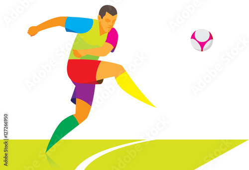 The young football striker strikes at goal