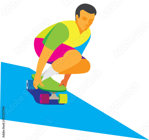 A young teenager on a skateboard down the hill