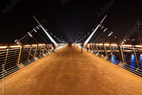 Dubai Skyline at night from new Dubai Canal, U.A.E