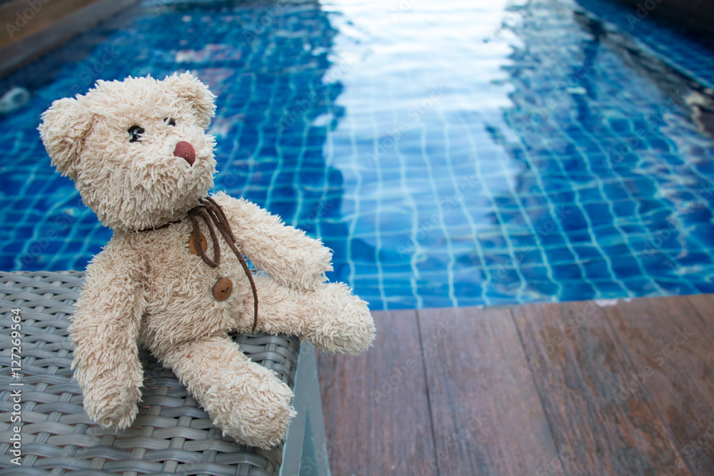 Teddy Bear Sitting near Swimming Pool (Concept about love) Stock Photo Adobe Stock
