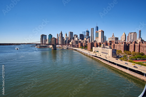 NEW YORK CITY - SEPTEMBER 25: FDR Drive along East River on Manhattan with the Downtown skyline and Brooklyn Bridge in the background photo