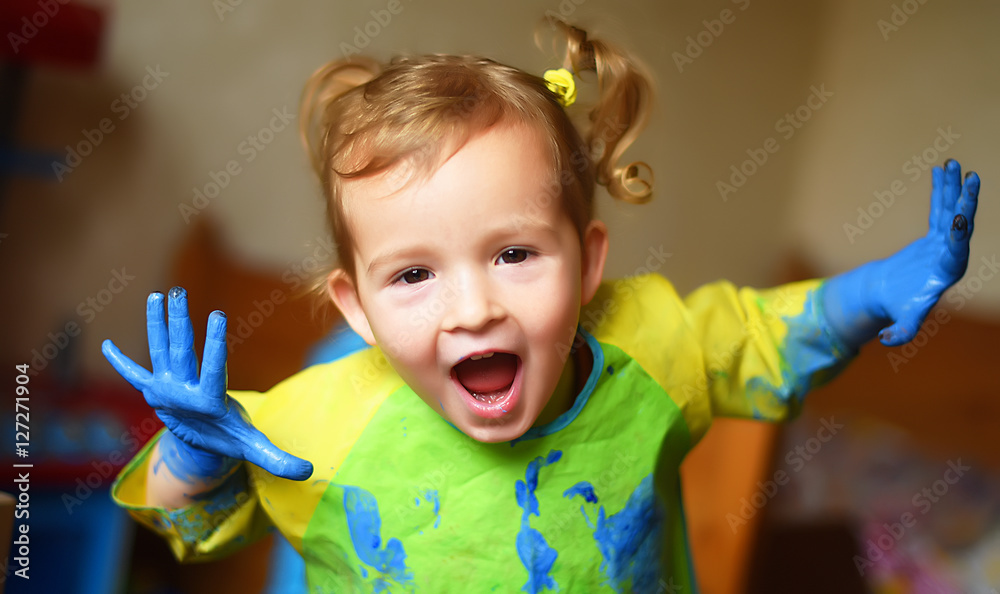 portrait child close-up girl with funny hair dirty hands and paint happy portrait child close-up girl with funny hair dirty hands and paint happy