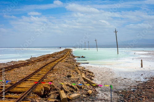 Old railway at Chaqia (Chakayan) salt lake, Qinghai, China photo