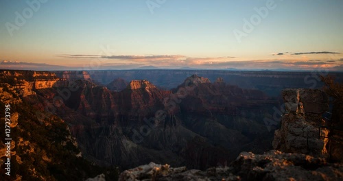 Grand Canyon National Park, Arizona, USA - view near Bright Angel Point at North Rim with red and orange rocks at sunset - Timelapse with zoom in 