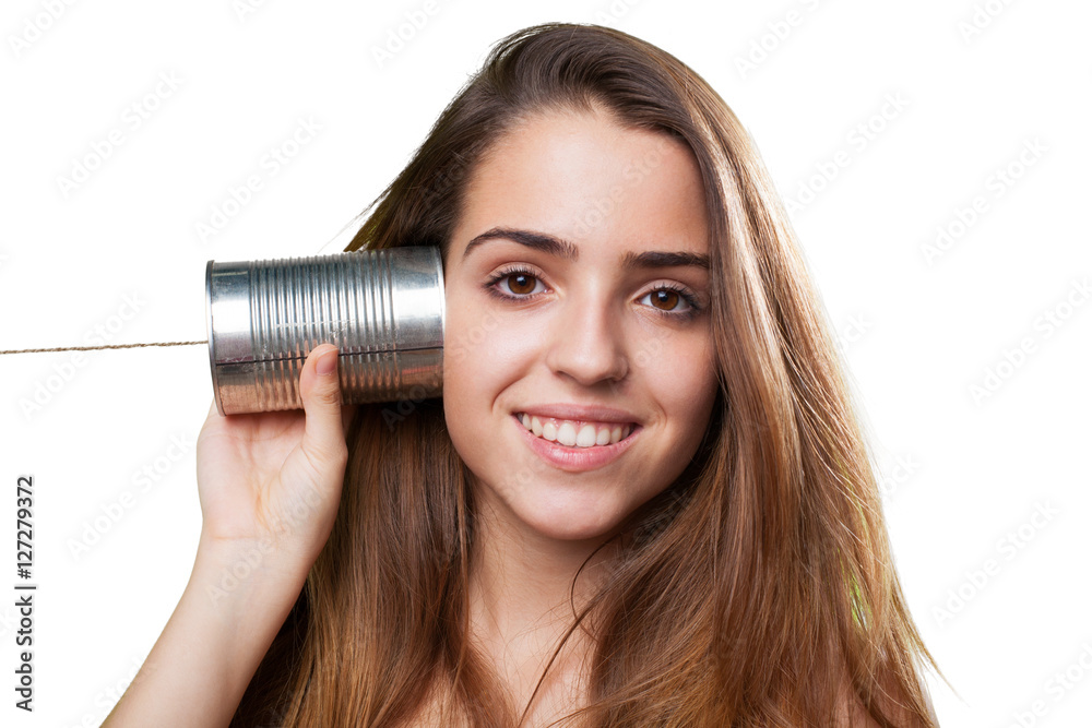 young woman using a tin can phone on white young woman using a tin can phone on white