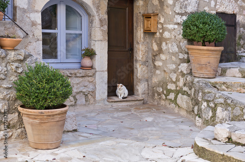 Small patio with flowers in the old village Gourdon © arbalest
