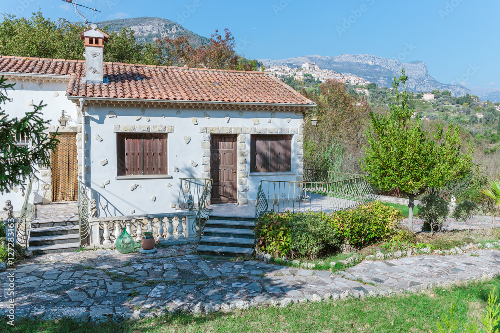 Little white house with a slate roof in Provence, France