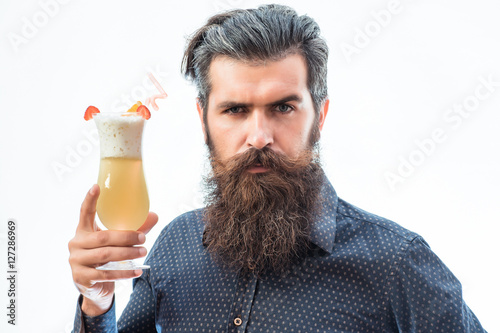 bearded man with nonalcoholic cocktail