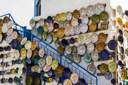 Beautiful ornamental plate display laid over moroccan house in remote village in atlas mountain 