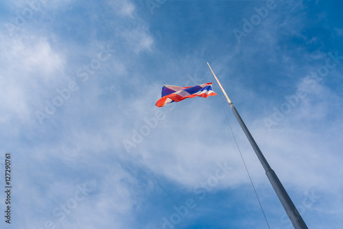 Flag of Thailand with blue sky