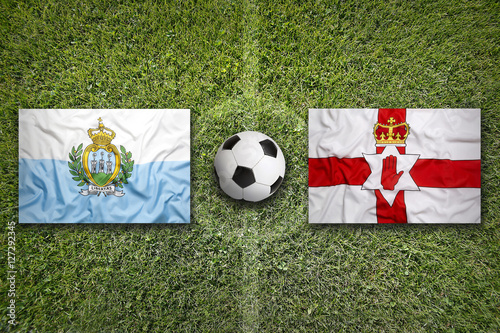San Marino vs. Northern Ireland flags on soccer field