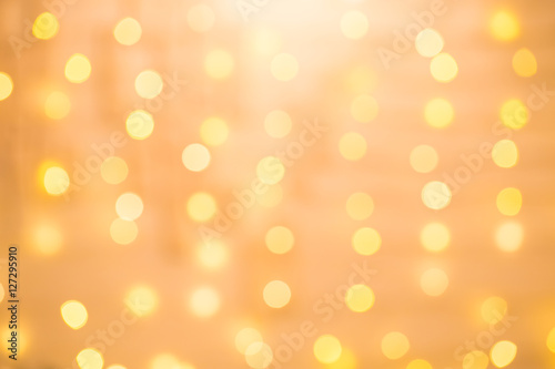 Defocused gold abstract Christmas Glitter Lights bokeh Background