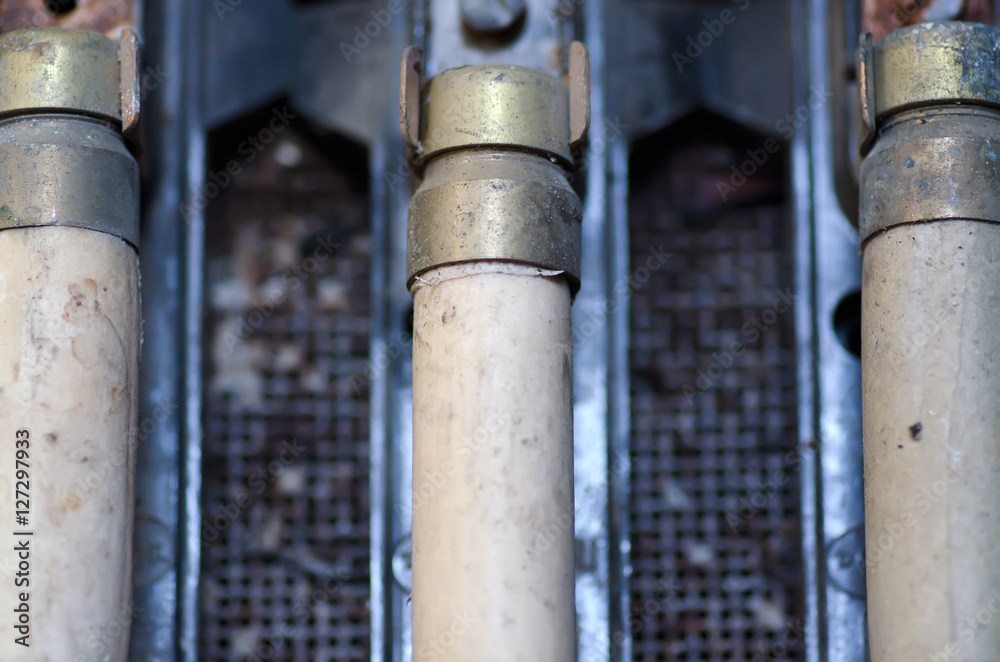 Old rusty electrical fuses with terminals Old rusty electrical fuses with terminals