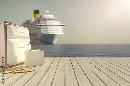 Photo some luggage and a cruise ship in the background