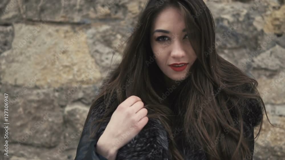 City walking of beautiful brunette girl, having fun in snowy winter time City walking of beautiful brunette girl, having fun in snowy winter time