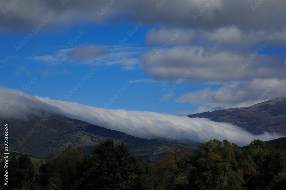 Fototapeta premium misty and cloudy autumn high in the mountains.