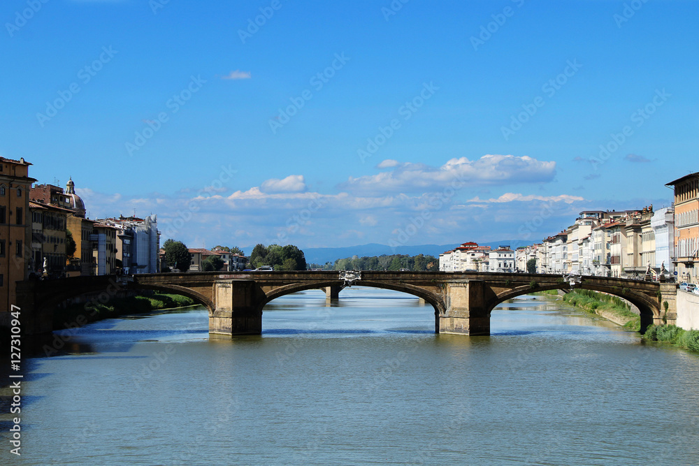 Florence. Italy. Summer view of the city. Bridge Ponte Santa Trinita. Arno River.