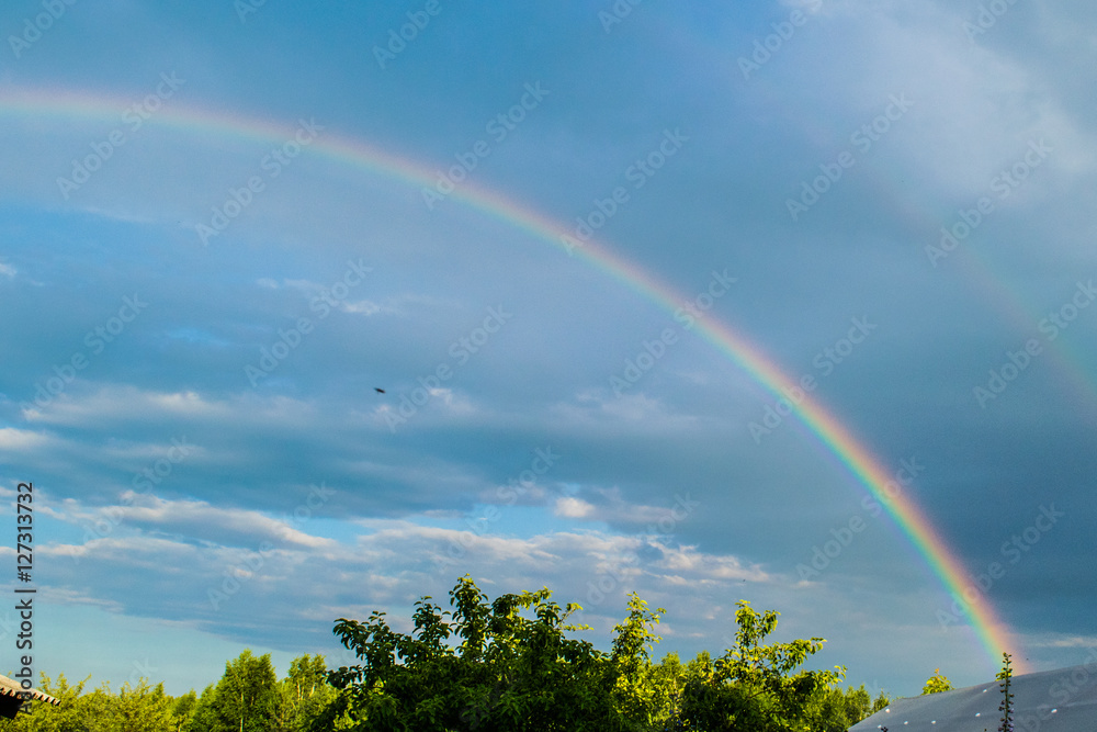 Rainbow in the storm sky