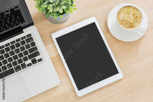 tablet mockup with coffee and laptop