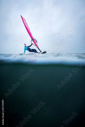 waterline with frontview windsurfer
